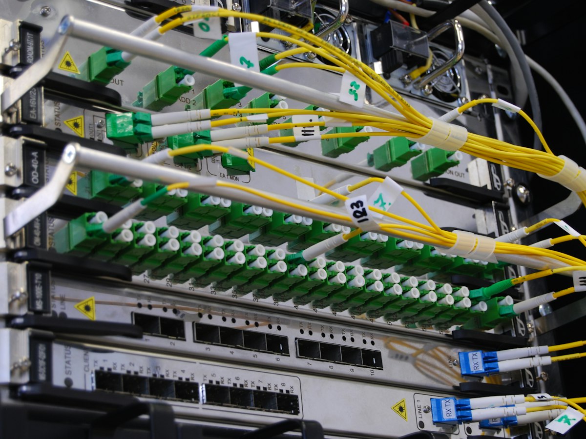Fiber optic cables connected to a network switch